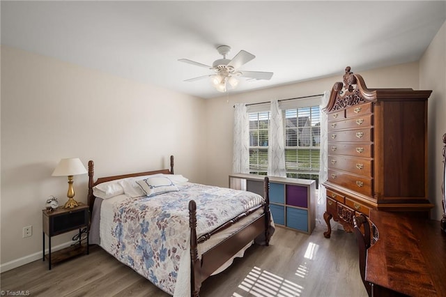 3972 Creekside Ct, Winston-Salem, NC 27127 - bedroom with wood finished floors, ceiling fan, and baseboards