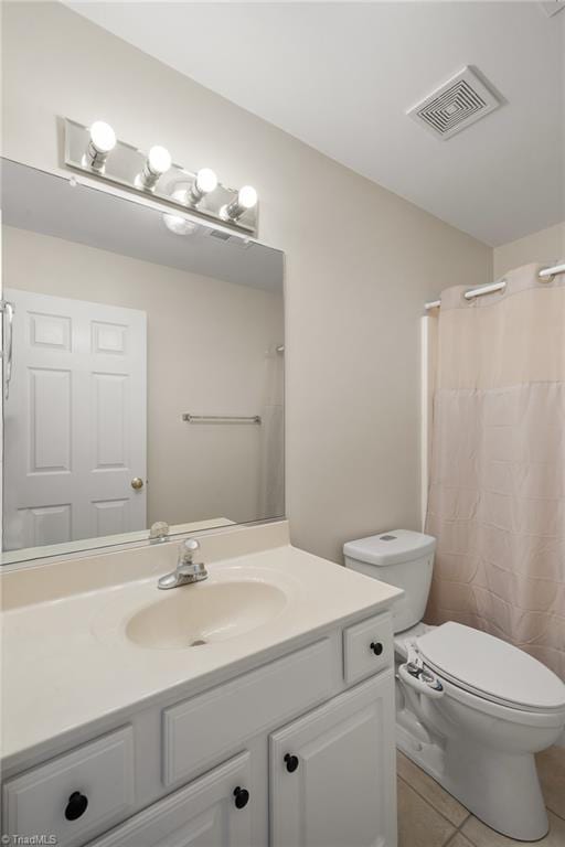 3972 Creekside Ct, Winston-Salem, NC 27127 - full bath featuring vanity, tile patterned flooring, toilet, and a shower with curtain