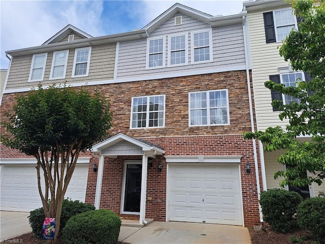 10 Dunlevy Way, Greensboro, NC 27455 - multi unit property with concrete driveway, brick siding, and stone siding