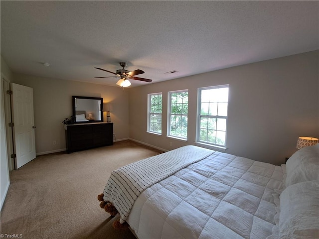 10 Dunlevy Way, Greensboro, NC 27455 - bedroom featuring carpet, baseboards, and a ceiling fan