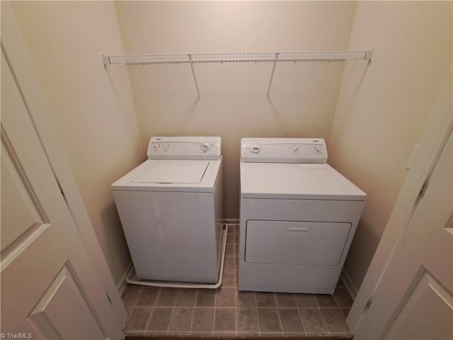 10 Dunlevy Way, Greensboro, NC 27455 - laundry area with washer and clothes dryer and tile patterned flooring