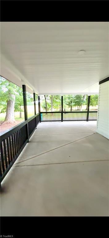 937 Haynes Rd, Summerfield, NC 27358 - view of patio / terrace featuring a carport