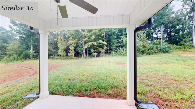 view of yard featuring ceiling fan