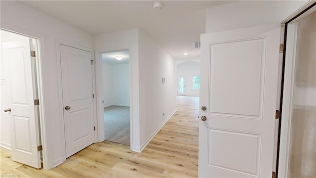 corridor featuring light wood-type flooring