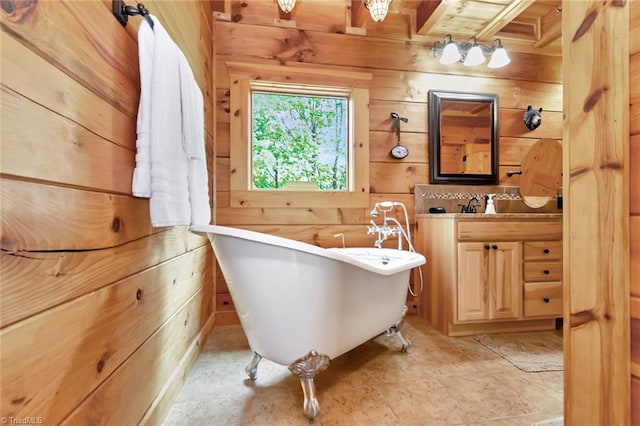 650 Sweetwater Rd, Boomer, NC 28606 - full bath featuring wood walls, a freestanding bath, and vanity