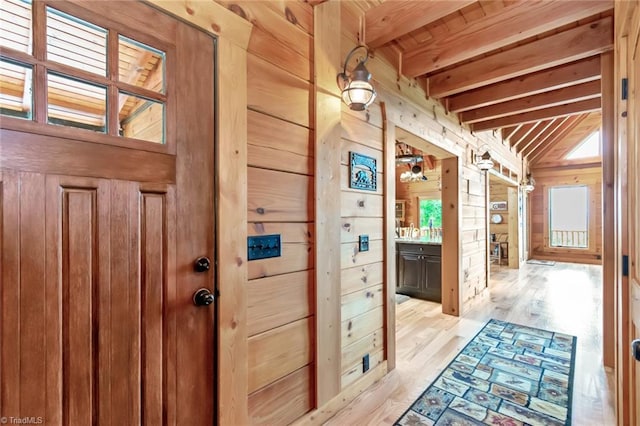 650 Sweetwater Rd, Boomer, NC 28606 - foyer entrance featuring wood walls, wood ceiling with exposed beams, and light wood-style flooring