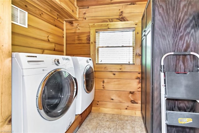 650 Sweetwater Rd, Boomer, NC 28606 - laundry room featuring washing machine and clothes dryer and wooden walls