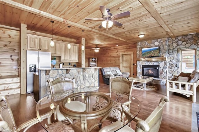650 Sweetwater Rd, Boomer, NC 28606 - dining space featuring wooden ceiling with exposed beams, a fireplace, ceiling fan, and dark wood-style floors