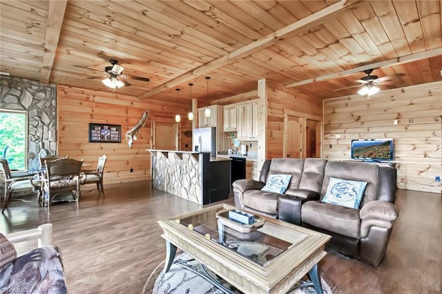 650 Sweetwater Rd, Boomer, NC 28606 - living room featuring a ceiling fan, wood ceiling with exposed beams, wood walls, and light wood finished floors