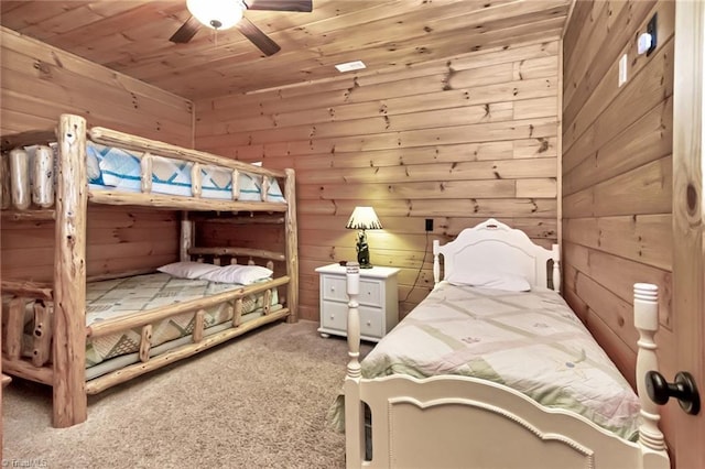 650 Sweetwater Rd, Boomer, NC 28606 - bedroom featuring carpet floors, wooden walls, wooden ceiling, and a ceiling fan