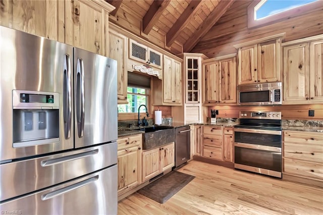650 Sweetwater Rd, Boomer, NC 28606 - kitchen featuring appliances with stainless steel finishes, light brown cabinets, dark stone countertops, light wood finished floors, and wooden ceiling