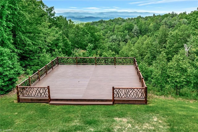 650 Sweetwater Rd, Boomer, NC 28606 - deck with a forest view and a lawn