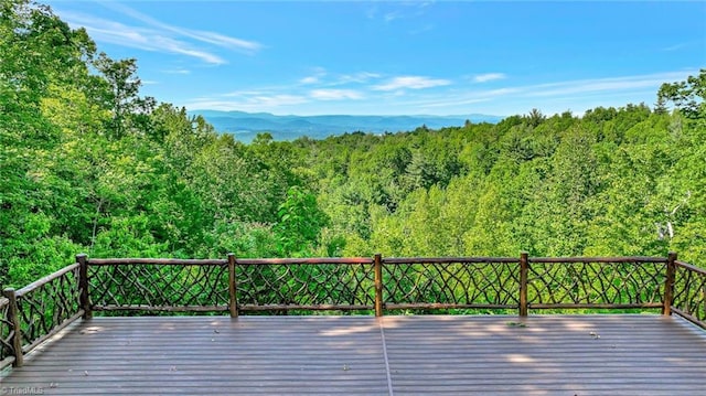 650 Sweetwater Rd, Boomer, NC 28606 - wooden deck featuring a view of trees