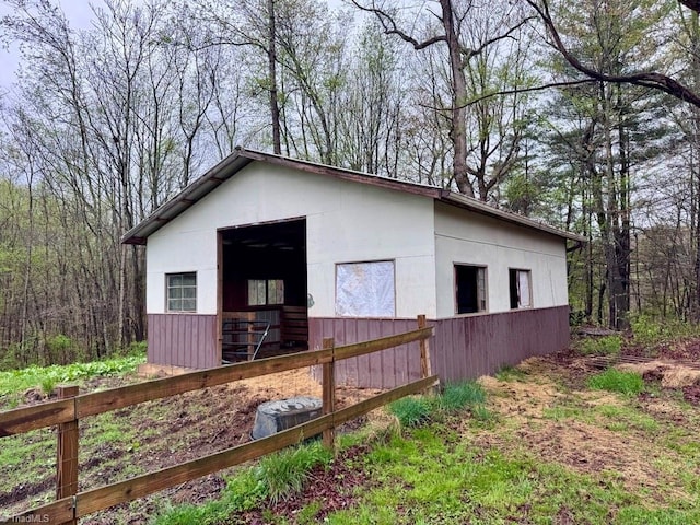 431 Needham Rd, Pilot Mountain, NC 27041 - view of side of home featuring an outbuilding and a view of trees