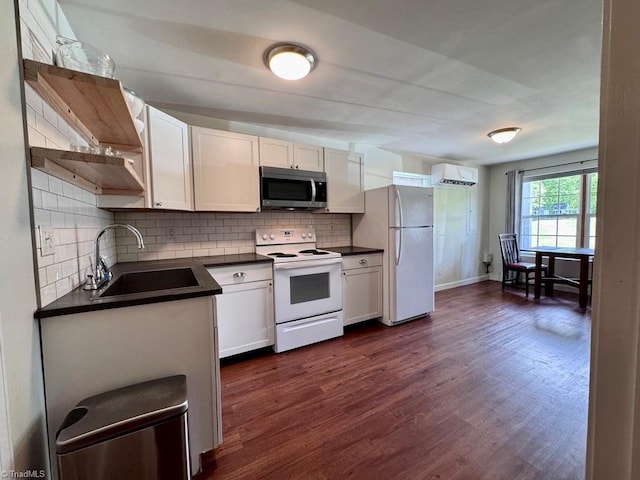 431 Needham Rd, Pilot Mountain, NC 27041 - kitchen featuring white appliances, a sink, dark countertops, open shelves, and backsplash