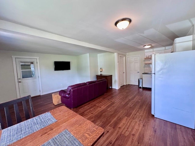 431 Needham Rd, Pilot Mountain, NC 27041 - dining space with dark wood-type flooring and baseboards