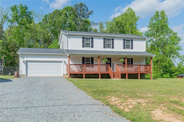 1765 Midway School Rd, Winston-Salem, NC 27107 - view of front of house with a front yard, a porch, driveway, and a garage
