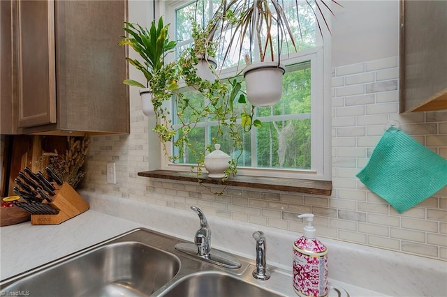 1765 Midway School Rd, Winston-Salem, NC 27107 - room details with light countertops, decorative backsplash, and a sink