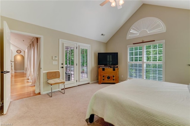 bedroom with carpet floors, high vaulted ceiling, access to exterior, a ceiling fan, and visible vents