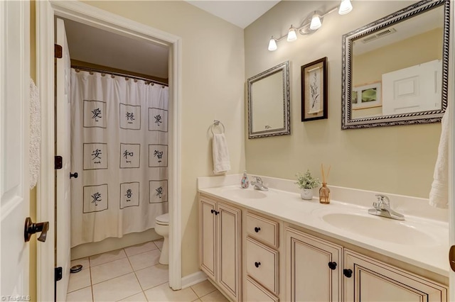 full bath with visible vents, a sink, tile patterned flooring, and toilet