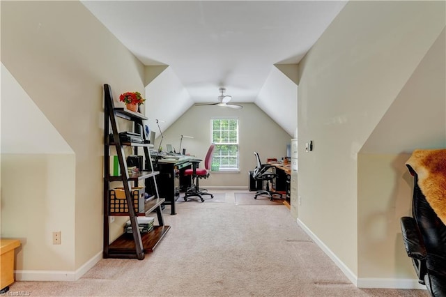 carpeted office with baseboards and lofted ceiling