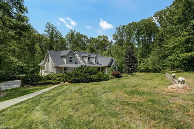 view of property exterior featuring a yard