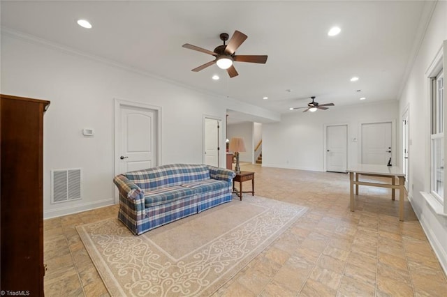 living room featuring visible vents, recessed lighting, baseboards, and ornamental molding