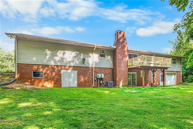 2215 Hickswood Rd, High Point, NC 27265 - back of property featuring a yard, brick siding, a chimney, and a wooden deck