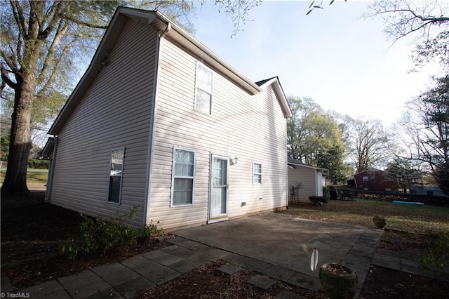 view of home's exterior with a patio area