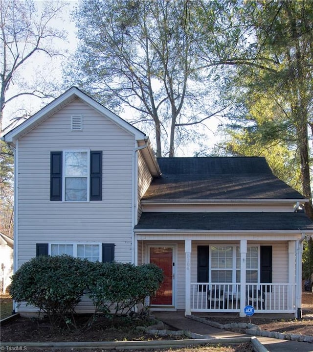 view of front of property featuring covered porch