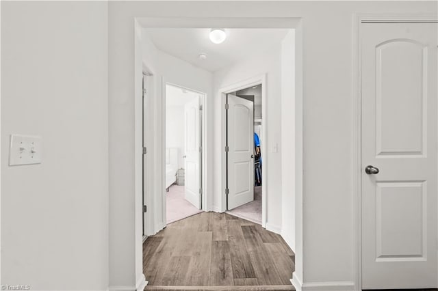 574 Freeport Ct, Winston-Salem, NC 27127 - corridor featuring wood finished floors and baseboards