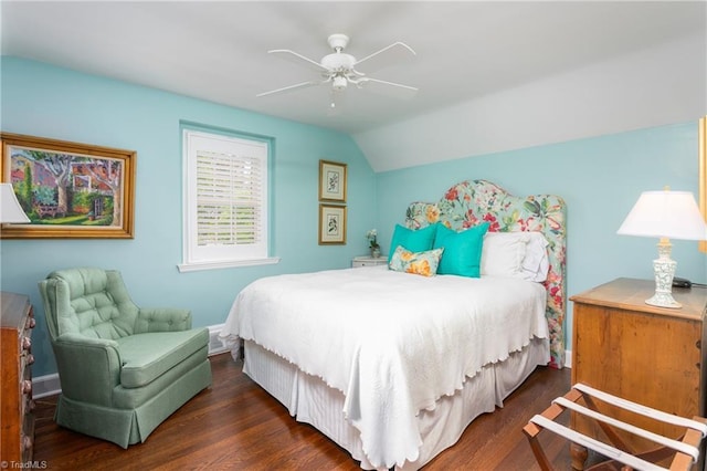 bedroom featuring a ceiling fan, dark wood finished floors, and lofted ceiling