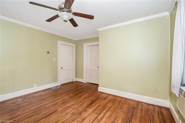 3753 Konnoak Dr SW, Winston-Salem, NC 27127 - spare room with ornamental molding, wood finished floors, and a ceiling fan