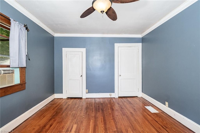 3753 Konnoak Dr SW, Winston-Salem, NC 27127 - unfurnished bedroom with wood finished floors, crown molding, and ceiling fan