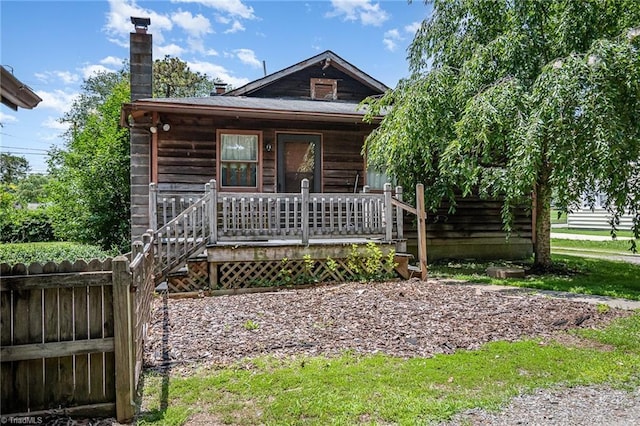3753 Konnoak Dr SW, Winston-Salem, NC 27127 - view of front of house with a porch and a chimney