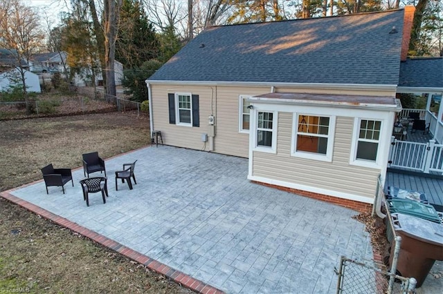 back of house with a patio area