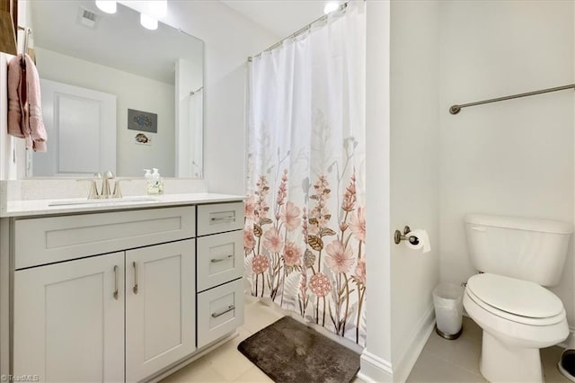 755 Gibb St, Winston-Salem, NC 27106 - full bathroom with tile patterned flooring, toilet, vanity, baseboards, and curtained shower