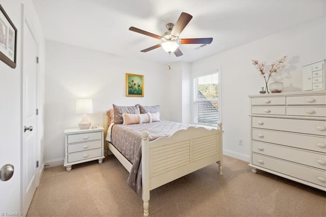 755 Gibb St, Winston-Salem, NC 27106 - bedroom with light carpet, baseboards, and ceiling fan