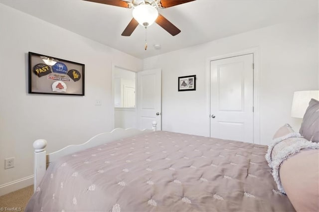755 Gibb St, Winston-Salem, NC 27106 - carpeted bedroom with baseboards and ceiling fan