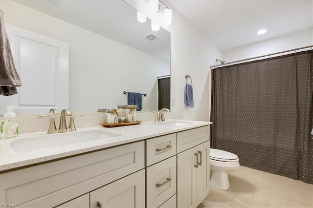 755 Gibb St, Winston-Salem, NC 27106 - bathroom with toilet, double vanity, a shower with shower curtain, and tile patterned flooring
