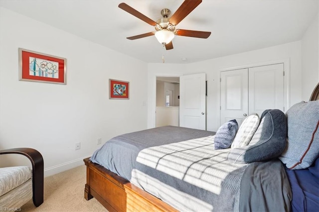 755 Gibb St, Winston-Salem, NC 27106 - bedroom with light carpet, baseboards, a closet, and a ceiling fan