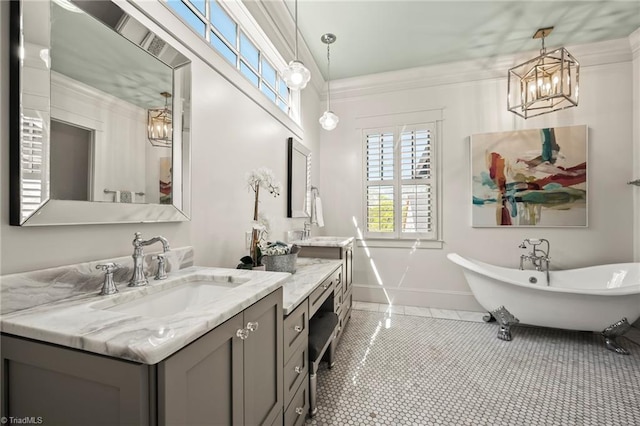 239 Glade View Ct, Winston-Salem, NC 27101 - full bath featuring a chandelier, a freestanding tub, two vanities, baseboards, and tile patterned flooring