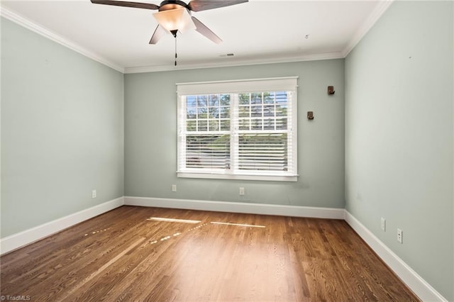 239 Glade View Ct, Winston-Salem, NC 27101 - spare room with crown molding, wood finished floors, ceiling fan, and baseboards