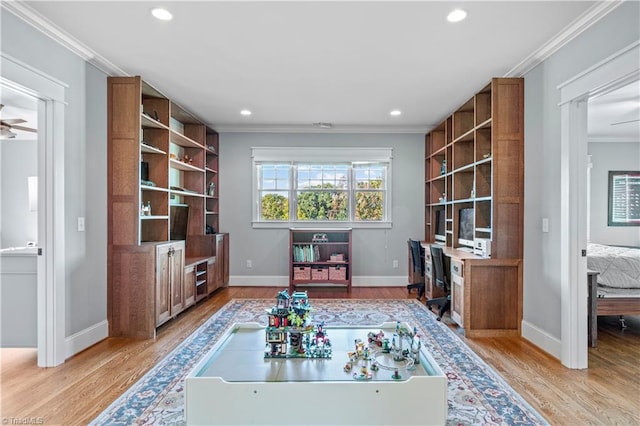 interior space featuring ornamental molding, recessed lighting, and light wood-style floors