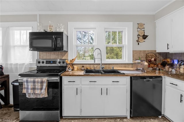 kitchen with sink, white cabinets, and black appliances