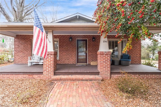 entrance to property with covered porch