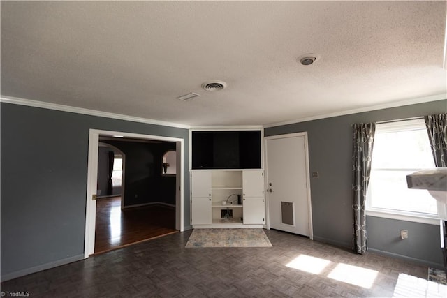 3607 Stonehurst Pl, High Point, NC 27265 - unfurnished room featuring baseboards, ornamental molding, and a textured ceiling
