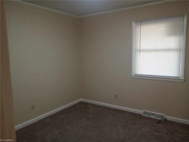 carpeted empty room with crown molding