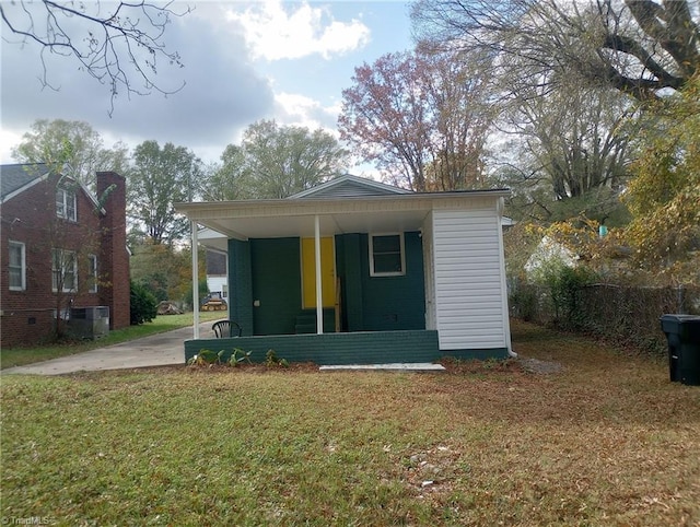 view of outbuilding featuring a lawn