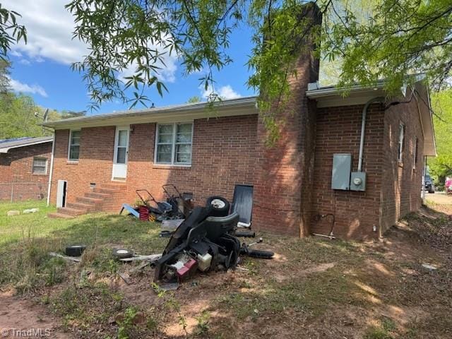 1226 Lewis St, Eden, NC 27288 - rear view of property with brick siding and entry steps
